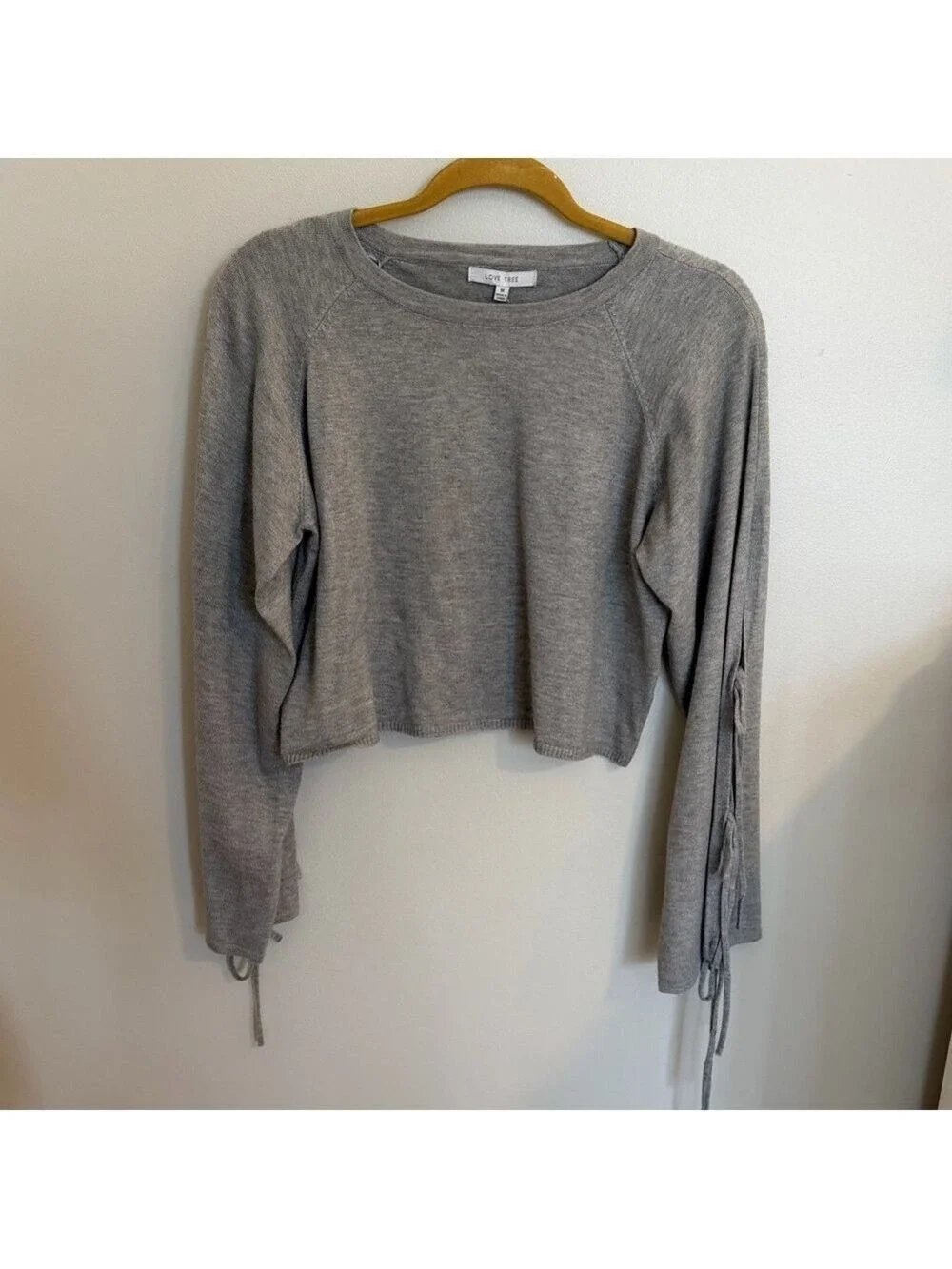 Lovetree Lace Up Sleeve Sweater